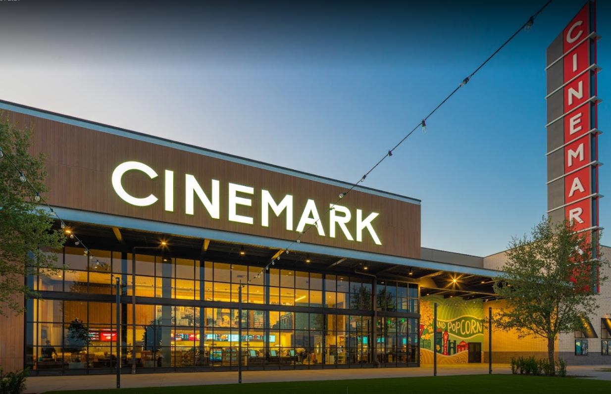 A movie theater with a sign that says cinemamark.