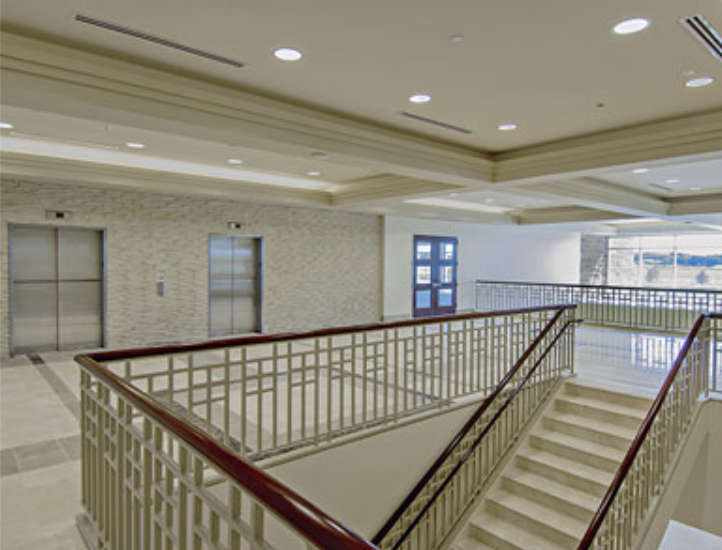 A stairway with a railing.