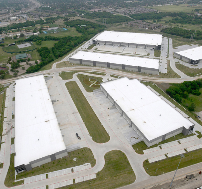 An aerial view of a large warehouse.