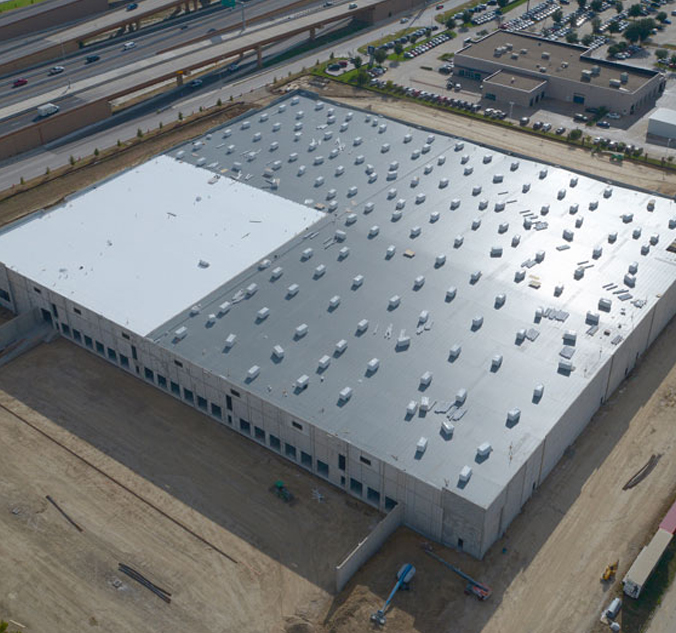An aerial view of a large warehouse.