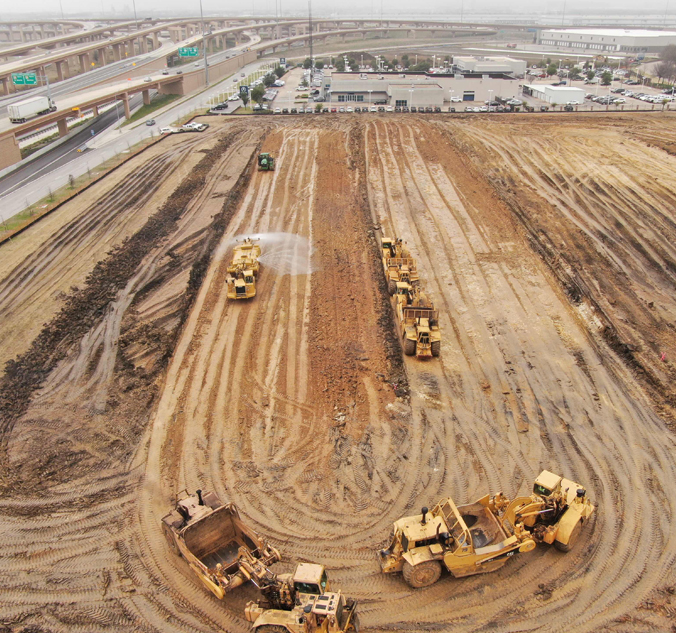 An aerial view of a construction site with bulldozers and bulldozers.