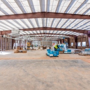The inside of a large building under construction.