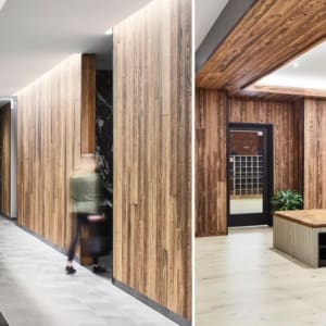 Two pictures of a lobby with wood paneling.