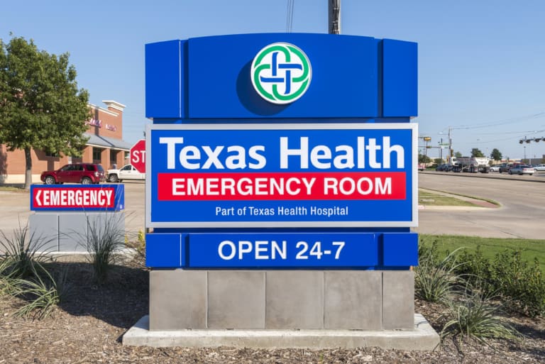 Texas Health Emergency Room sign outside a medical facility, open 24/7 and part of Texas Health Hospital, located near local amenities like self storage for added convenience.